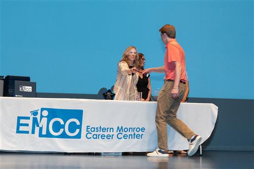 Matthew Williams receiving his award